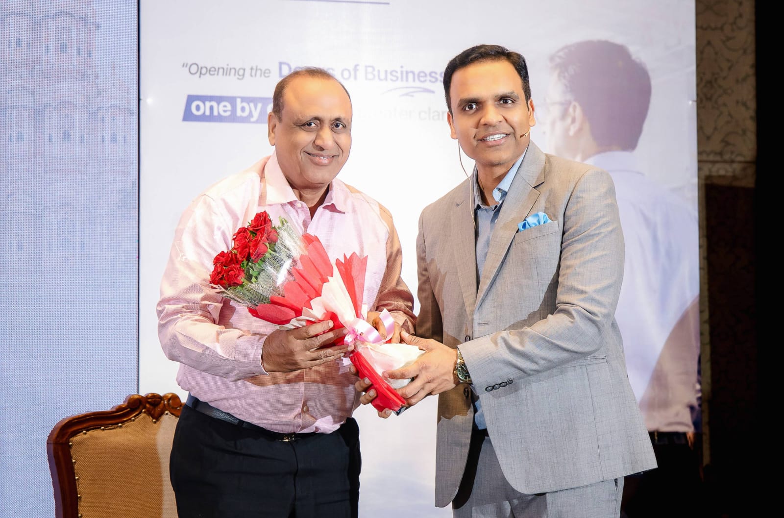 Guest being welcomed on stage at MSME Growth Summit 2026
