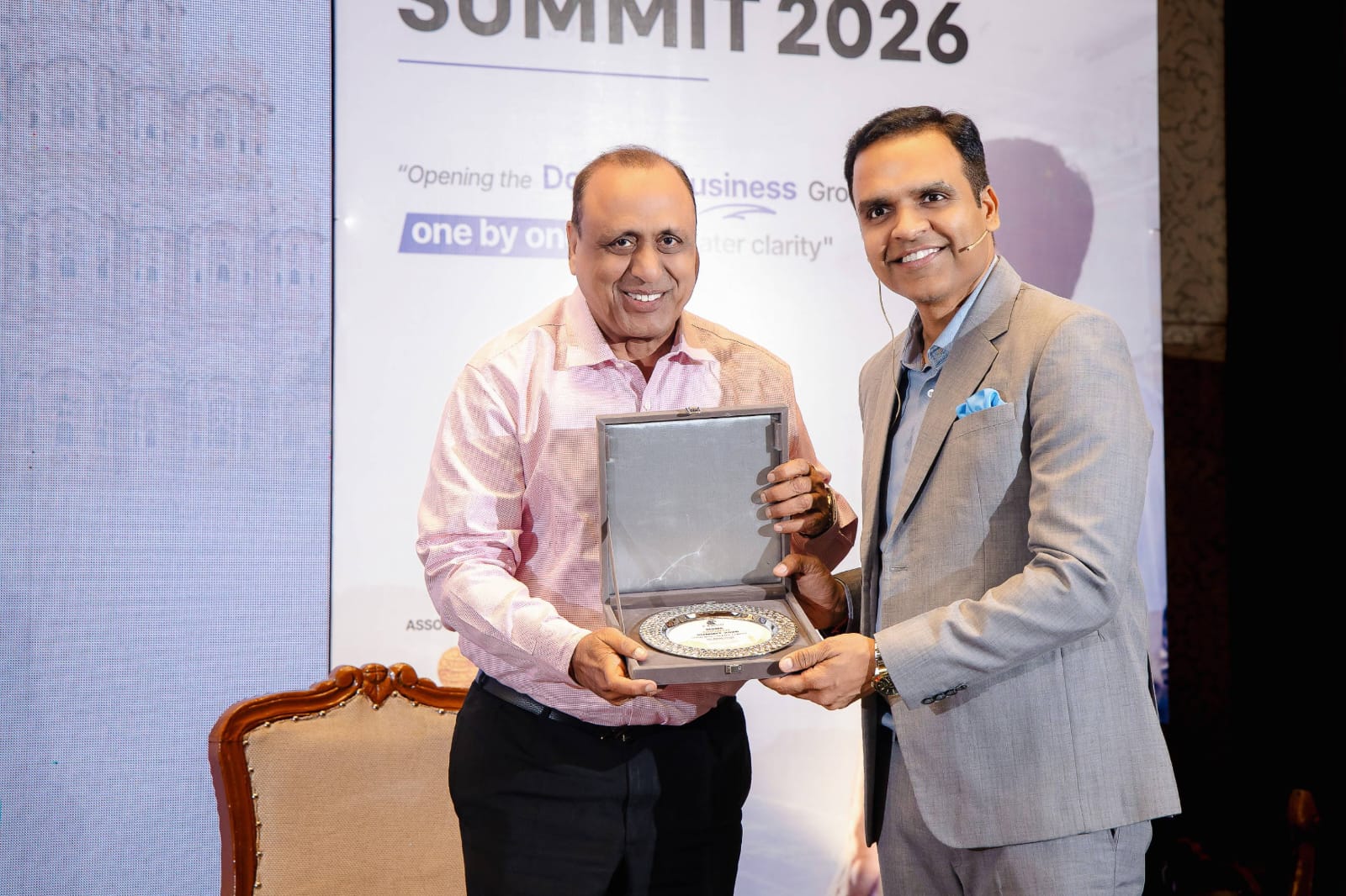 Senior guest honoured with a memento at MSME Growth Summit 2026