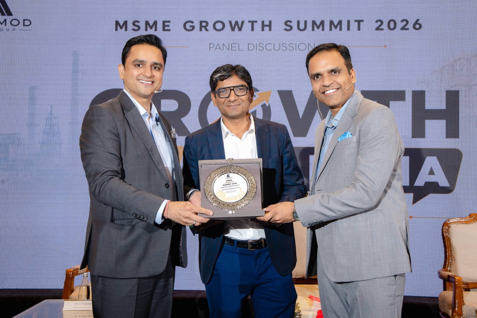 AAMOD Group founders presenting an honour at MSME Growth Summit 2026
