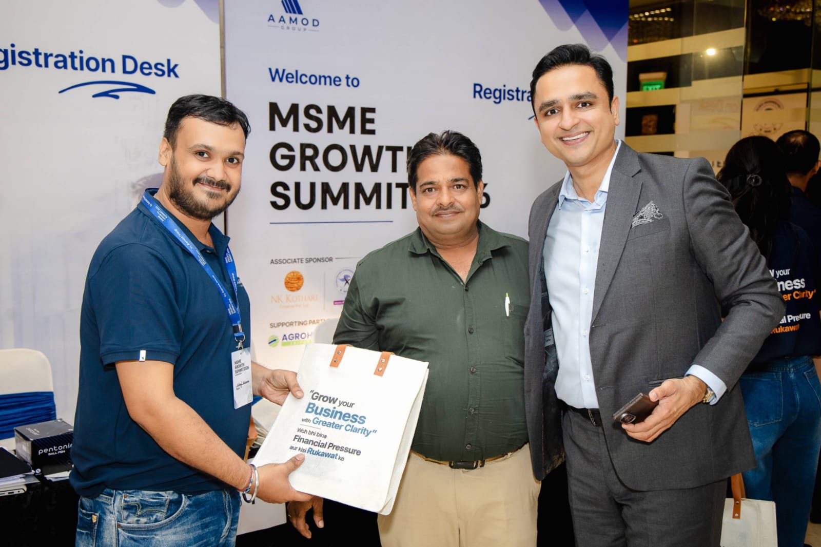 Promoter welcomed at the summit registration desk